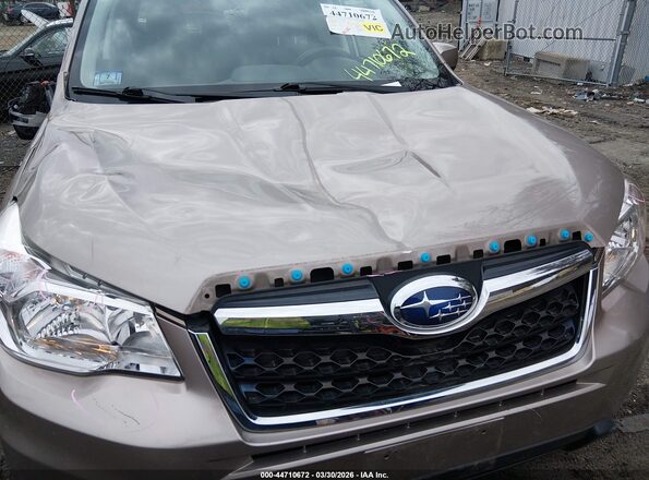 JF2SJAFC2GH414617 2016 SUBARU FORESTER 2.5 Желто-коричневый Вид спереди