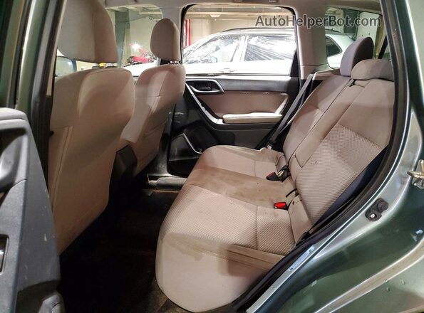 JF2SJAGC4HH472521 2017 SUBARU FORESTER 2.5 Зеленый Вид задней части салона
