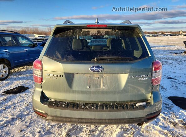 JF2SJAXC9GH407324 2016 SUBARU FORESTER 2.5I TO Green Widok z tyłu
