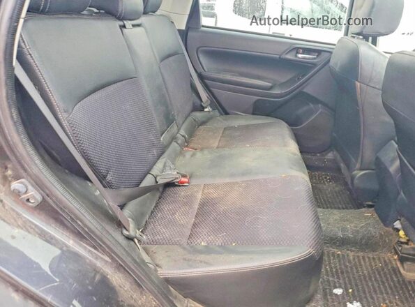 JF2SJGDC9GH514588 2016 SUBARU FORESTER2. Черный Вид задней части салона