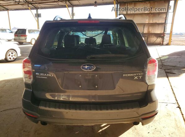 JF2SJGEC2HH557489 2017 SUBARU FORESTER2. Gray Widok z tyłu