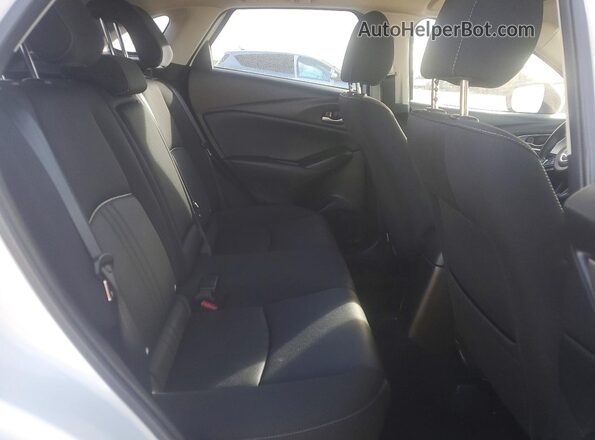 JM1DKDB71M1516350 2021 MAZDA CX-3 White Vista interior trasera