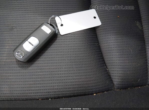 JM1DKFB74G0137784 2016 MAZDA CX-3 Red Vista del salpicadero