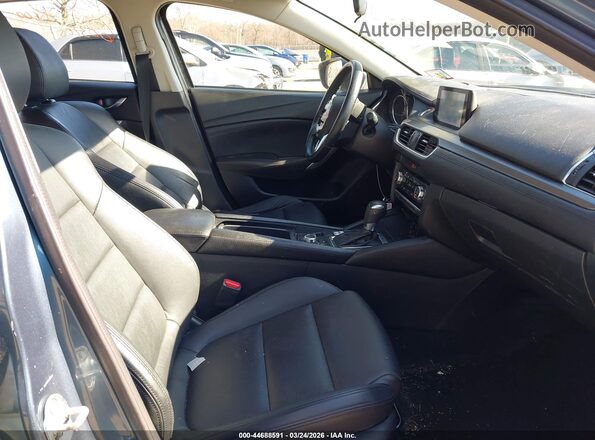 JM1GJ1V53G1478343 2016 MAZDA 6 Синий Вид салона спереди