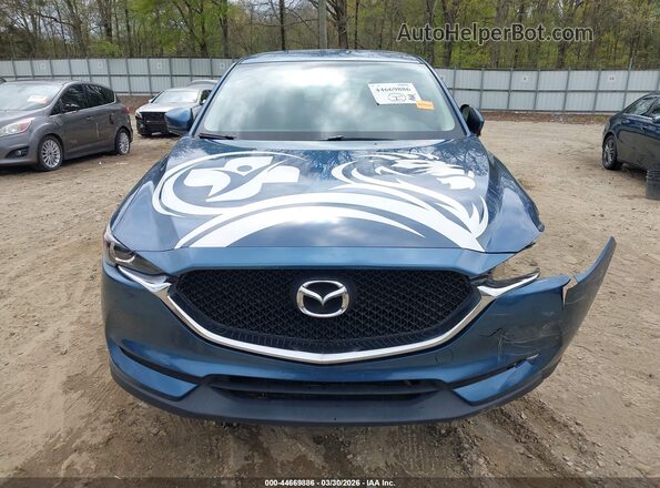 JM3KFABL6H0216829 2017 MAZDA CX-5 Teal Widok wnętrza z tyłu