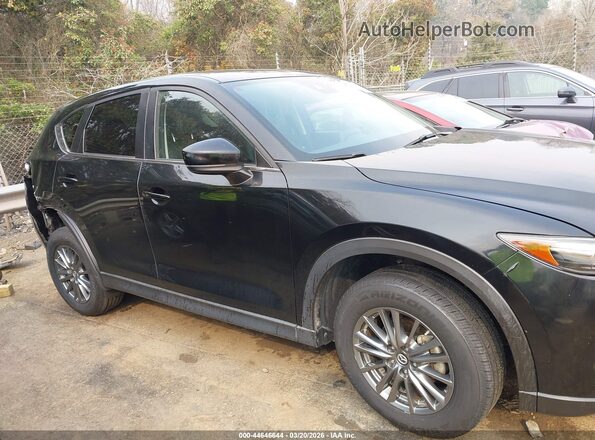 JM3KFACL3H0158340 2017 MAZDA CX-5 Black Widok wnętrza z tyłu