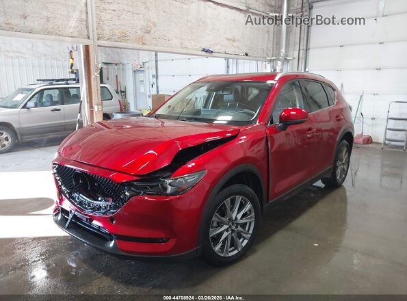 JM3KFBAY4M0413107 2021 MAZDA CX-5 Red Vista tres cuartos delantera izquierda