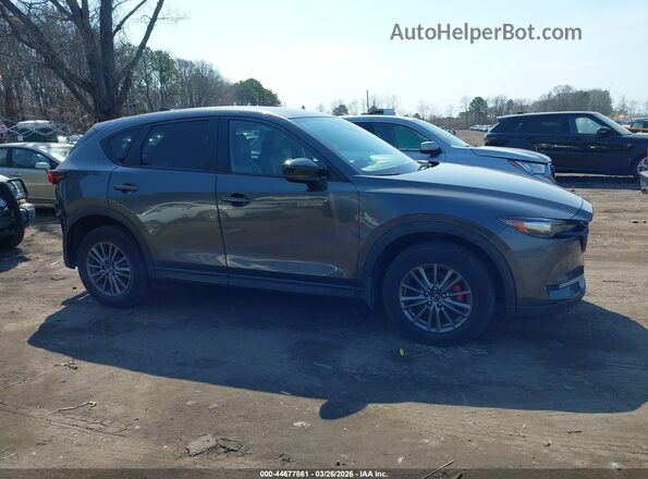 JM3KFBCL5H0195279 2017 MAZDA CX-5 Gray Widok wnętrza z tyłu