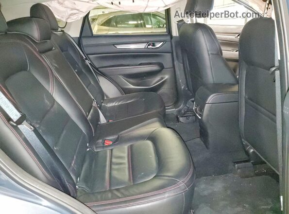 JM3KFBCM6S0587607 2025 MAZDA CX-5 Серый Вид задней части салона