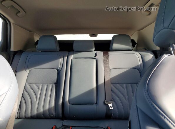 JN1DF0CD4RM736382 2024 NISSAN ARIYA Black უკანა სავარძლების ხედი