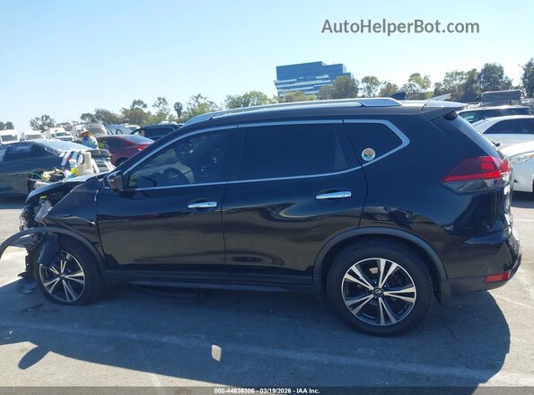JN8AT2MT2KW267561 2019 NISSAN ROGUE Черный Вид задней части салона