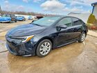2024 Toyota Corolla Hybrid Le Black vin: JTDBCMFE0R3040424