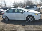 2024 Toyota Corolla Hybrid Le White vin: JTDBCMFE3R3045245