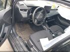 2024 Toyota Corolla Hybrid Le Black vin: JTDBCMFE3RJ023449