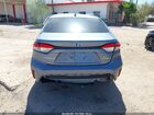 2024 Toyota Corolla Hybrid Le Light Blue vin: JTDBCMFEXRJ018913