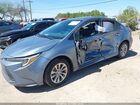 2024 Toyota Corolla Hybrid Le Light Blue vin: JTDBCMFEXRJ018913
