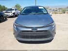2024 Toyota Corolla Hybrid Le Light Blue vin: JTDBCMFEXRJ018913