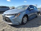 2021 Toyota Corolla Hybrid Le Gray vin: JTDEAMDE1MJ027367