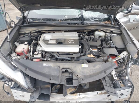 JTHU9JBH4K2000492 2019 LEXUS UX 250H Silver Вид ззаду