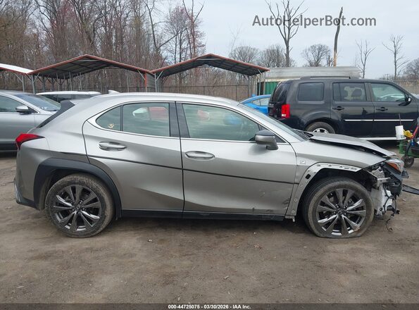 JTHU9JBH4K2000492 2019 LEXUS UX 250H Silver Вид задньої частини салону