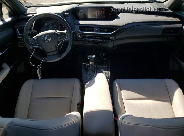 JTHY3JBHXK2012505 2019 LEXUS UX Gray Vista del salpicadero