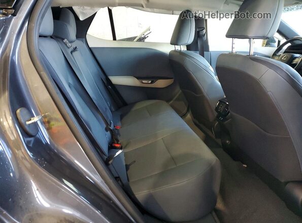 JTJAAAAB0PA021326 2023 LEXUS RZ Charcoal Widok wnętrza z tyłu
