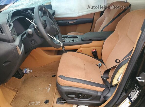 JTJAAAAB2PA014975 2023 LEXUS RZ Черный Вид салона спереди