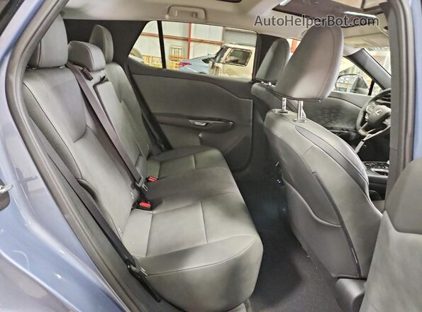 JTJAAAAB9RA024647 2024 LEXUS RZ Бирюзовый Вид задней части салона