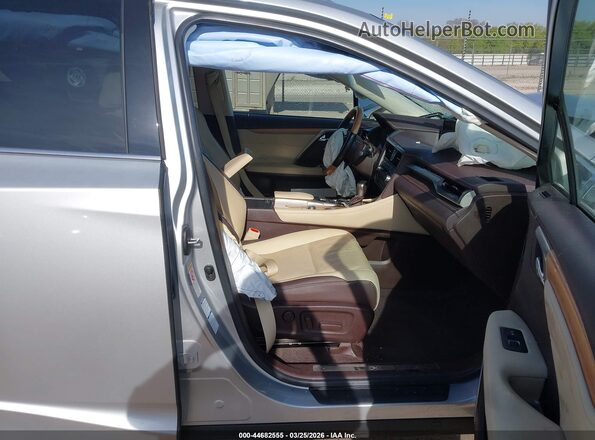 JTJBZMCA5G2010495 2016 LEXUS RX 350 Серебряный Вид салона спереди