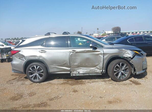 JTJDGKCA1J2002193 2018 LEXUS RX 450HL Silver უკანა სალონის ხედი