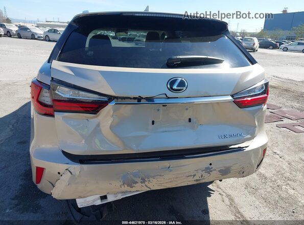 JTJDZKCA7J2011197 2018 LEXUS RX 350L Золотой Вид спереди