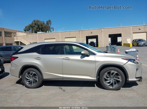 JTJDZKCA7J2011197 2018 LEXUS RX 350L Золотой Вид задней части салона