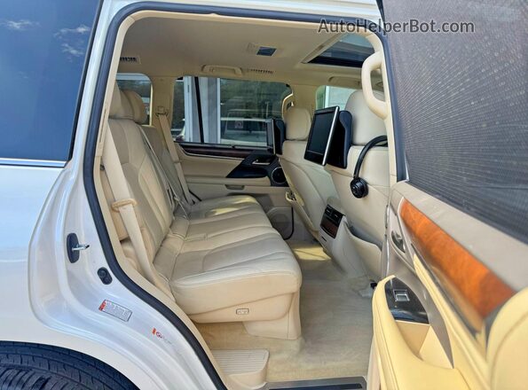 JTJHY7AX0G4198272 2016 LEXUS LX Белый Вид салона спереди