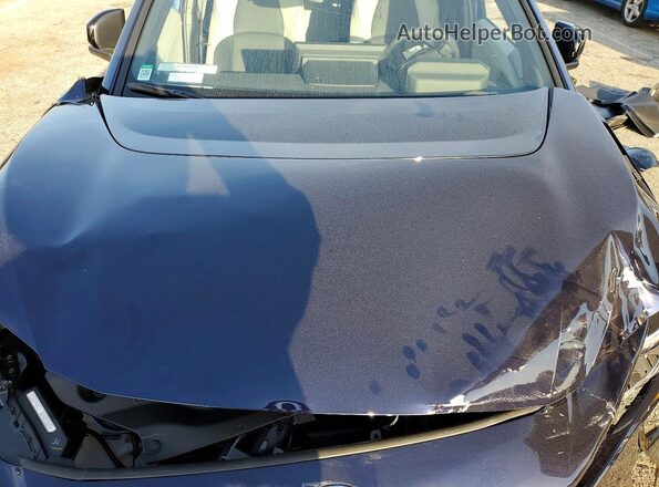 JTMBCAEB4TA000727 2026 TOYOTA LIMITED Purple Vista del compartimento del motor