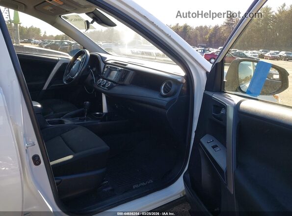 JTMBFREV9JJ728704 2018 TOYOTA LE White Vista interior delantera