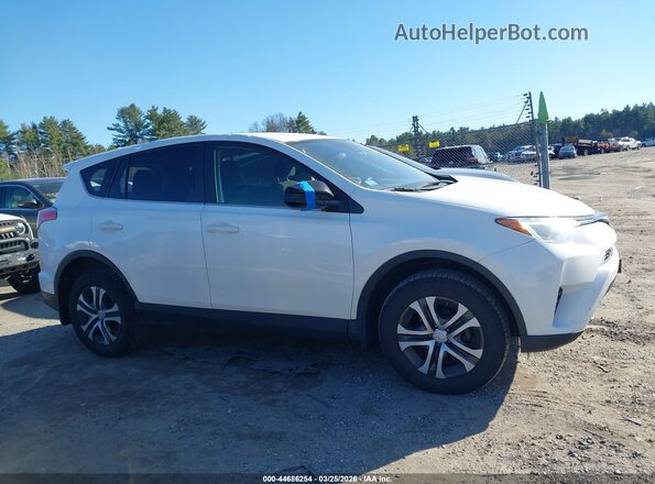 JTMBFREV9JJ728704 2018 TOYOTA LE White Vista interior trasera