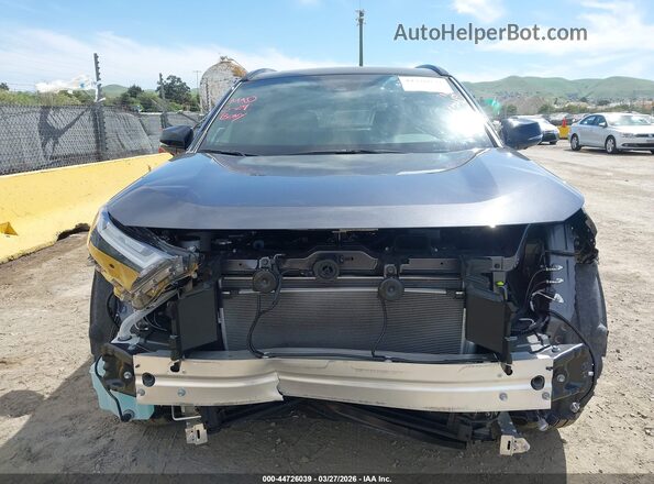 JTME6RFV0SJ088153 2025 TOYOTA RAV4 HYBRID Gray Widok wnętrza z tyłu