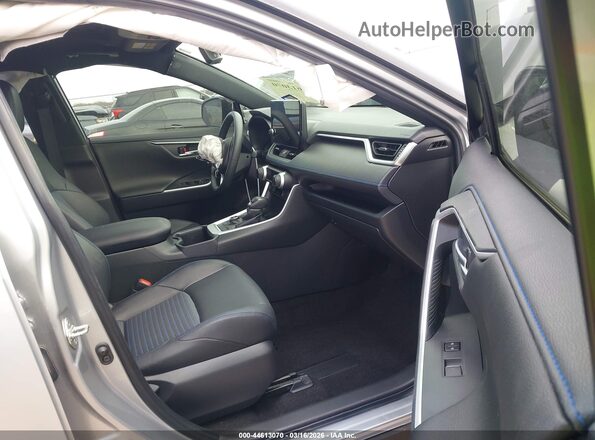 JTME6RFV6PJ033116 2023 TOYOTA RAV4 HYBRID Silver Widok wnętrza z przodu