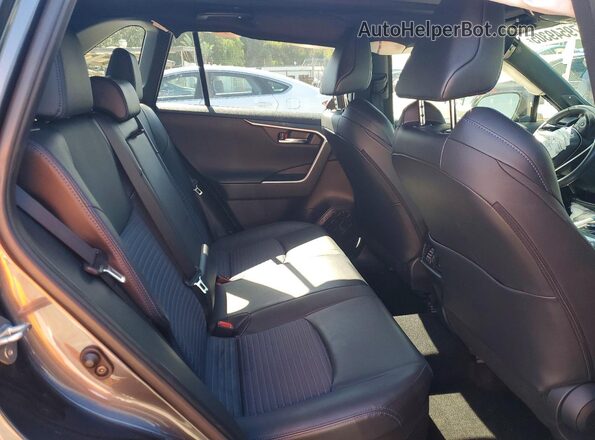 JTME6RFV8PJ031352 2023 TOYOTA RAV4 Gray Vista interior trasera