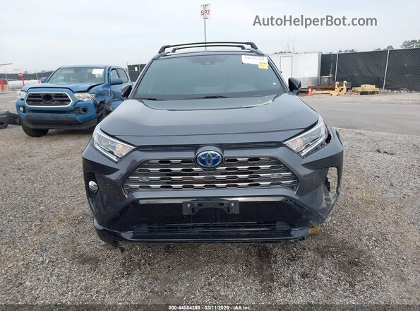 JTMEWRFV8KD521152 2019 TOYOTA RAV4 HYBRID Gray Вид задньої частини салону