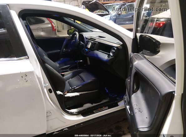 JTMJFREV4GD181926 2016 TOYOTA RAV4 White Front interior view