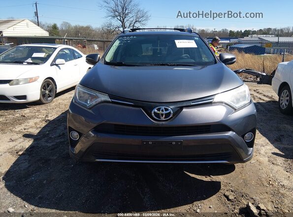 JTMRFREV6GJ055684 2016 TOYOTA LE Gray Vista del cuadro de instrumentos