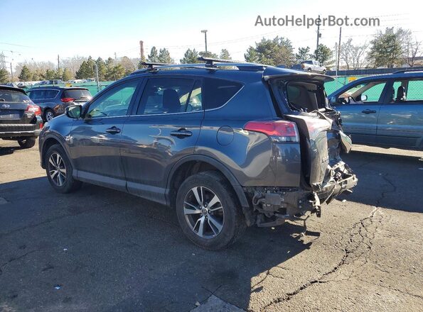JTMRFREV6JD241506 2018 TOYOTA RAV4 Gray Trasero izquierdo