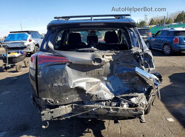 JTMRFREV6JD241506 2018 TOYOTA RAV4 Gray Vista trasera