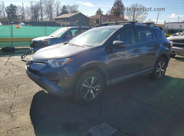 JTMRFREV6JD241506 2018 TOYOTA RAV4 Gray Vista tres cuartos delantera izquierda