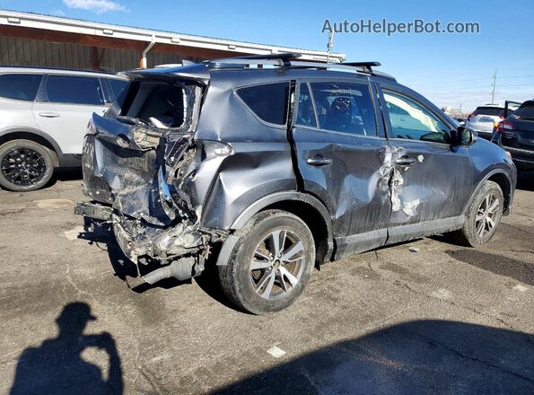 JTMRFREV6JD241506 2018 TOYOTA RAV4 Gray Trasero derecho