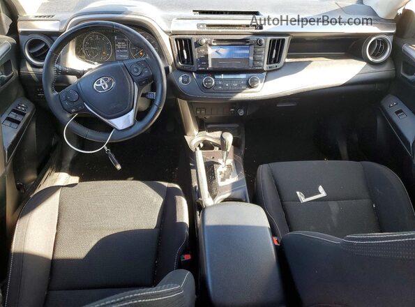 JTMRFREV6JD241506 2018 TOYOTA RAV4 Gray Vista del salpicadero