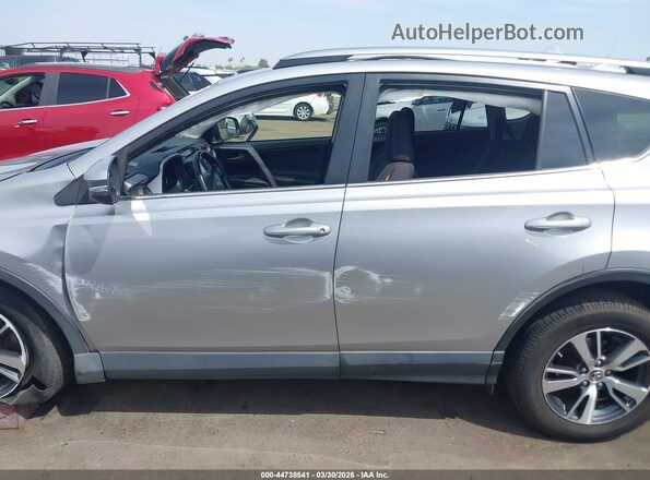 JTMWFREV0JJ201149 2018 TOYOTA LE Silver Rear interior view