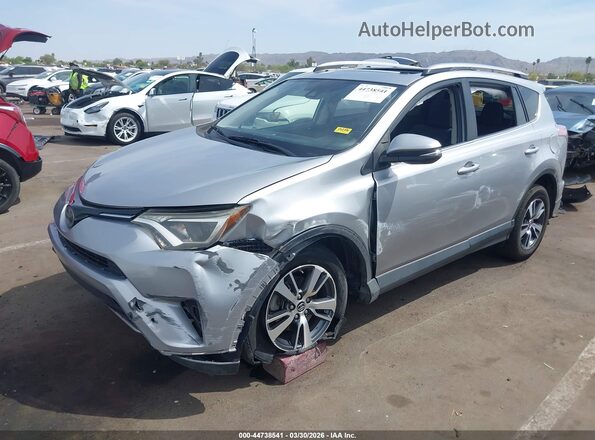 JTMWFREV0JJ201149 2018 TOYOTA LE Silver Front left