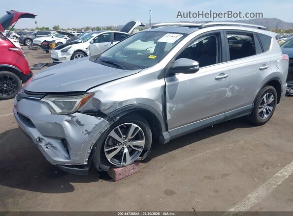 JTMWFREV0JJ201149 2018 TOYOTA LE Silver Front view